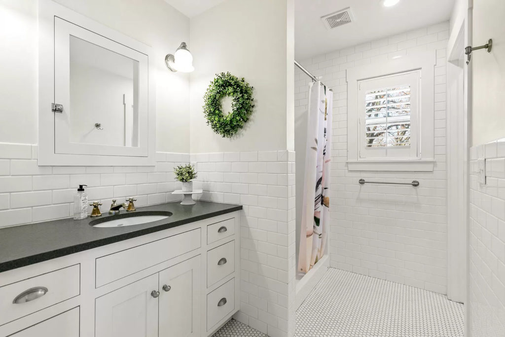 Craftsman/modern farmhouse bathroom with subway tile.